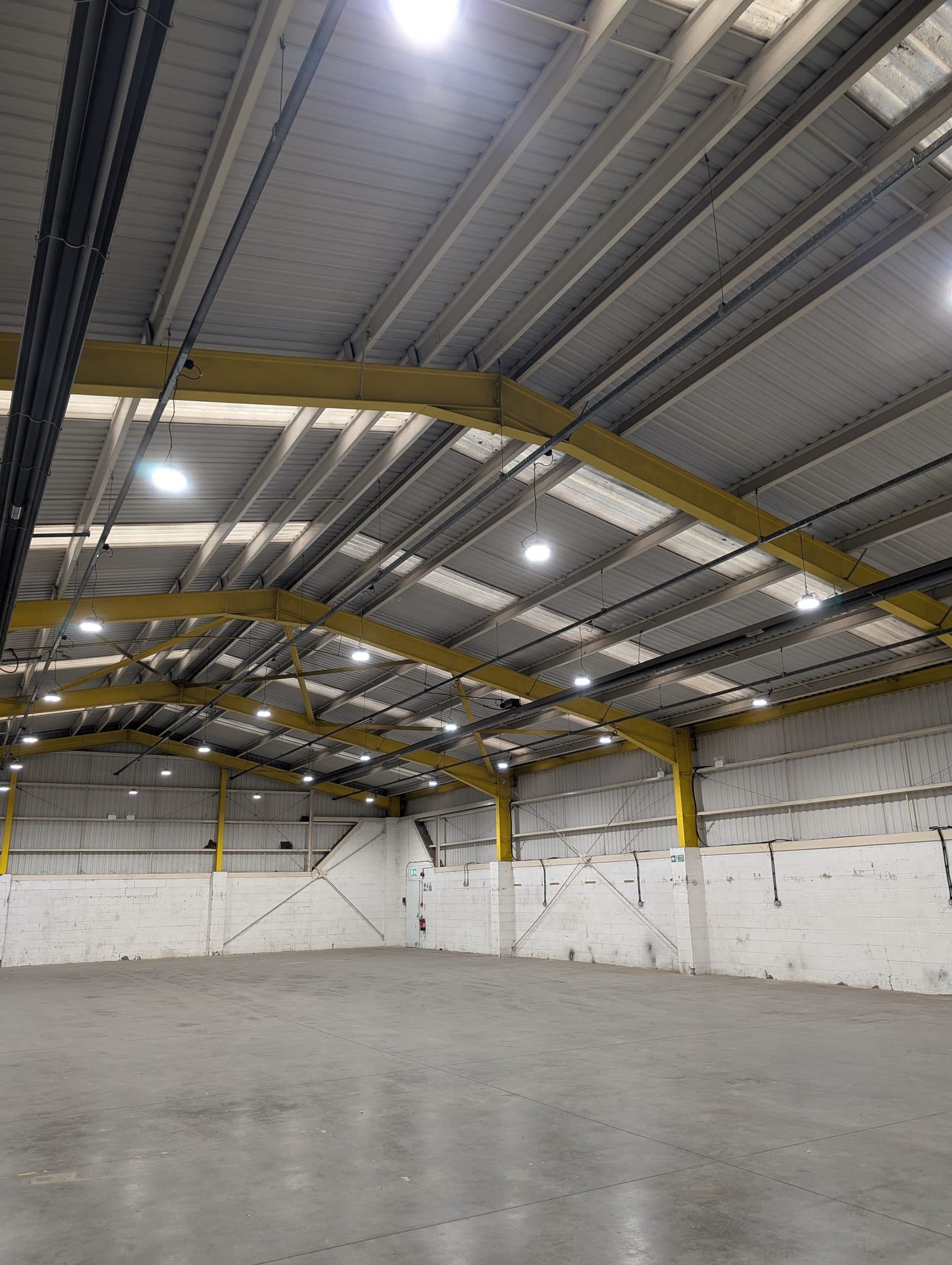 High-bay LED lighting and power installed in a large industrial unit